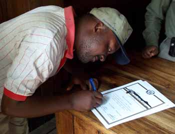 Nicholas signs our certificates